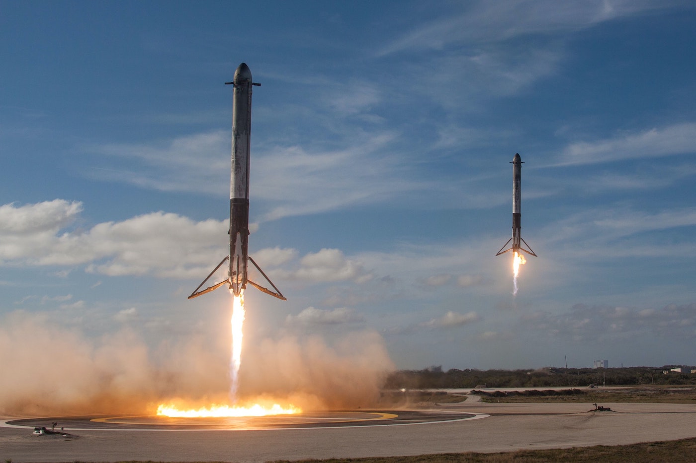 SpaceX booster rockets landing autonomously.